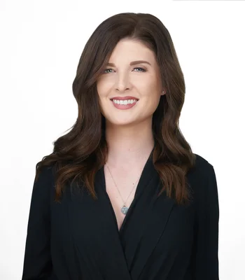 Portrait of Julia Rau, REALTOR®, Associate.