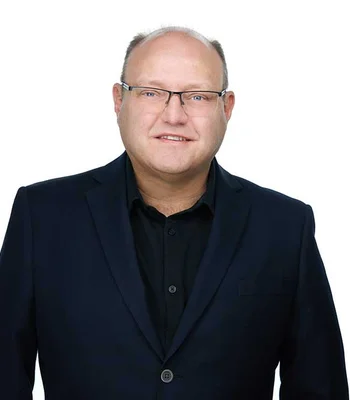 Portrait of Richard Widynowski, REALTOR®, Associate, ABR®.