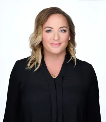 Portrait of Sommer Reid, REALTOR®, Associate.